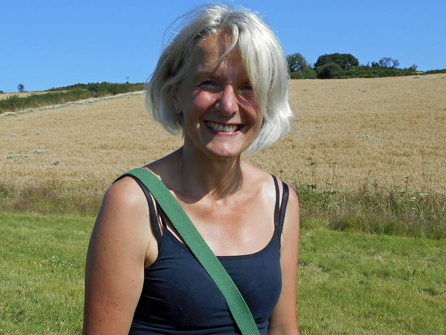 Smiling Jenny Bourne in the countryside