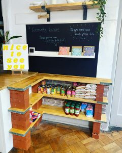 shelving with tins, jars and packets