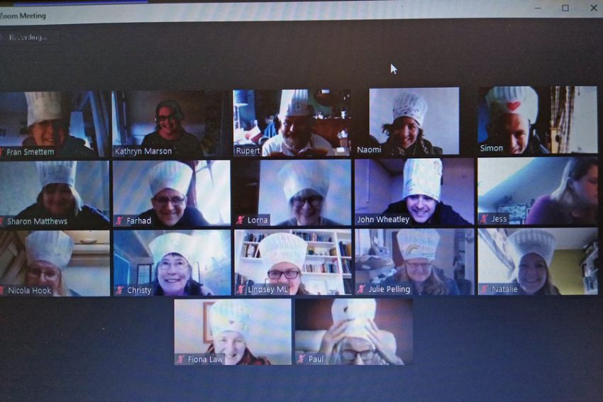 Zoom screenshot of participants in chef's hats